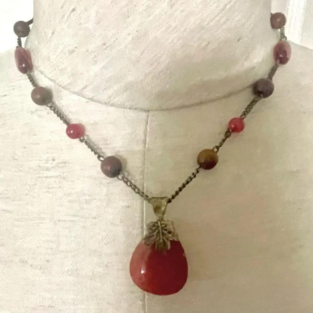 Orange pendant with leaf accent beaded pendant necklace